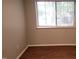 Bed room with window and window blinds and vinyl floors at 1222 Teakwood Pl, Raleigh, NC 27606