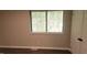 Cozy bedroom with wood floor and a window bringing in lots of natural light at 1222 Teakwood Pl, Raleigh, NC 27606