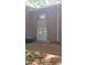Exterior view of brick home with central air conditioning units at 1222 Teakwood Pl, Raleigh, NC 27606