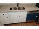 Modern kitchen with stainless steel sink, granite countertops and dishwasher at 1222 Teakwood Pl, Raleigh, NC 27606