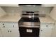 Kitchen featuring white cabinets and stainless steel range at 1222 Teakwood Pl, Raleigh, NC 27606