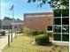 View of the Banks D. Kerr Gathering YMCA with American flag at 13017 Townfield Dr, Raleigh, NC 27614