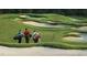 Scenic view of the Hasentree golf course featuring rolling green hills and sand traps at 1309 Magnolia Gln Cir, Wake Forest, NC 27587