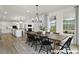 Open-concept great room with fireplace and hardwood floors at 15 Celtic Ln, Lillington, NC 27546