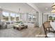 Bright and airy living room featuring hardwood floors and ample natural light at 15 Celtic Ln, Lillington, NC 27546