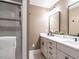 Bathroom with dual sinks and a walk-in shower with tile accents at 1510 Hanover St, Raleigh, NC 27608