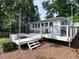 Inviting backyard deck with outdoor seating, grill, and firepit, perfect for relaxation and outdoor gatherings at 1510 Hanover St, Raleigh, NC 27608