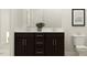 Modern bathroom with a dual sink vanity, toilet, and neutral decor for a calming and functional space at 1552 Bright Coral Trl, Wendell, NC 27591