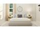 Charming bedroom featuring a comfortable bed, matching bedside tables, and a cozy decor at 1552 Bright Coral Trl, Wendell, NC 27591