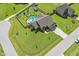 Aerial view of a home with manicured lawn, pool, shed, and a long driveway at 17 Kaki Ct, Selma, NC 27576