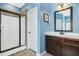 Well-lit bathroom featuring a stand-up shower and a vanity with great storage at 17 Kaki Ct, Selma, NC 27576