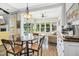 Breakfast nook has an eat in table with backyard and pool views at 17 Kaki Ct, Selma, NC 27576