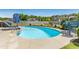 Beautiful kidney shaped pool featuring an attractive patio area perfect for relaxation and entertainment at 17 Kaki Ct, Selma, NC 27576