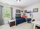 Comfortable bedroom featuring stylish decor and bright natural light at 1701 Bodwin Ln, Apex, NC 27502
