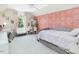 Comfortable bedroom featuring a plush bed, vanity, and soft natural light, perfect for relaxation and rejuvenation at 1701 Bodwin Ln, Apex, NC 27502