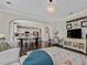 Open-concept living room showcasing the kitchen and dining area at 1701 Bodwin Ln, Apex, NC 27502