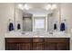 Bathroom featuring a vanity with a double sink and marble countertop at 178 Ashpole Trl, Clayton, NC 27520