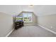 Bedroom with a window and TV on a stand, offering a cozy space for relaxation at 178 Ashpole Trl, Clayton, NC 27520
