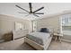 Bedroom features a bed, wardrobe, dresser, and a ceiling fan at 178 Ashpole Trl, Clayton, NC 27520