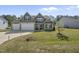 Charming two-story home featuring an attached two-car garage and a well-maintained lawn at 178 Ashpole Trl, Clayton, NC 27520
