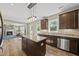 Open kitchen with granite countertops, center island and stainless steel appliances at 178 Ashpole Trl, Clayton, NC 27520