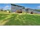 Spacious backyard, showing the home's back exterior and a grassy area at 1813 Lost Creek Ct, Apex, NC 27539