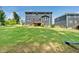 Expansive backyard featuring a lush lawn, a deck, and ample space for recreation at 1813 Lost Creek Ct, Apex, NC 27539