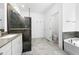 Bathroom showcasing modern sink and tiled shower, a toilet, and a soaking tub at 1813 Lost Creek Ct, Apex, NC 27539