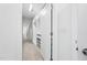 Walk-in closet boasts custom shelving, drawers, full length mirror and lighting at 1813 Lost Creek Ct, Apex, NC 27539