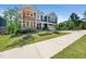 A two-story home with a well-maintained lawn and landscaping at 1813 Lost Creek Ct, Apex, NC 27539