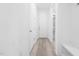 Hallway that offers convenient access to various areas of the house with ample storage and pleasing aesthetics at 1813 Lost Creek Ct, Apex, NC 27539