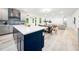 This stunning kitchen, with a seamless transition to the dining and living areas, boasts an open-concept layout at 1813 Lost Creek Ct, Apex, NC 27539
