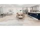 Open living space with a kitchen, dining area, and living room creates a welcoming atmosphere for Gathering and friends at 1813 Lost Creek Ct, Apex, NC 27539