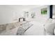Bright main bedroom features stylish decor, wood floors, and comfortable textures at 1813 Lost Creek Ct, Apex, NC 27539