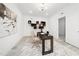 Bright office with a modern desk and decor providing an ideal space for remote work or creative endeavors at 1813 Lost Creek Ct, Apex, NC 27539