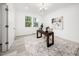 Bright home office with natural light, hardwood floors, and modern decor at 1813 Lost Creek Ct, Apex, NC 27539