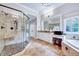 Elegant bathroom with walk-in shower, dual sink vanity, granite countertop, and marble floors at 187 Stoney Creek Way, Chapel Hill, NC 27517