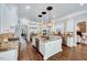 Spacious kitchen with granite countertops, stainless appliances and pendant lighting at 187 Stoney Creek Way, Chapel Hill, NC 27517