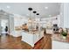 Gourmet kitchen with granite countertops, large center island, and stainless steel appliances at 187 Stoney Creek Way, Chapel Hill, NC 27517