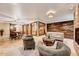 Inviting living room area with tile floors, fireplace, a dining table and chairs, comfortable seating and a wine cellar at 187 Stoney Creek Way, Chapel Hill, NC 27517