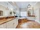 Spacious main bathroom with double vanity, soaking tub, and separate shower at 187 Stoney Creek Way, Chapel Hill, NC 27517