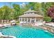 Aerial view of a pool house with a unique style overlooking the pool at 187 Stoney Creek Way, Chapel Hill, NC 27517