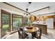 Sunlit breakfast nook with bay window and adjacent kitchen, perfect for casual dining at 2001 Lovdal Dr, Raleigh, NC 27613