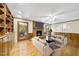 Bright living room featuring a fireplace, hardwood floors, and a neutral color palette at 2001 Lovdal Dr, Raleigh, NC 27613