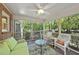 Inviting screened porch featuring comfortable seating and a serene view of the outdoors at 2001 Lovdal Dr, Raleigh, NC 27613