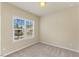 Bright bedroom featuring a large window that fills the space with natural light at 217 Griffis Dr, Stem, NC 27581