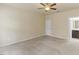 Spacious bedroom with ceiling fan and access to an en-suite bathroom at 217 Griffis Dr, Stem, NC 27581