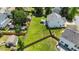 Aerial view of the expansive backyard, bordered by a wood fence and lush greenery at 228 Honeywell Way, Fuquay Varina, NC 27526