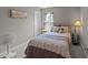 Cozy bedroom featuring carpet flooring, neutral walls, and a window with natural light at 228 Honeywell Way, Fuquay Varina, NC 27526