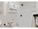 Clean, bright bathroom with storage cabinet, walk-in shower, and modern fixtures at 2311 Wintergreen Pl, Durham, NC 27707